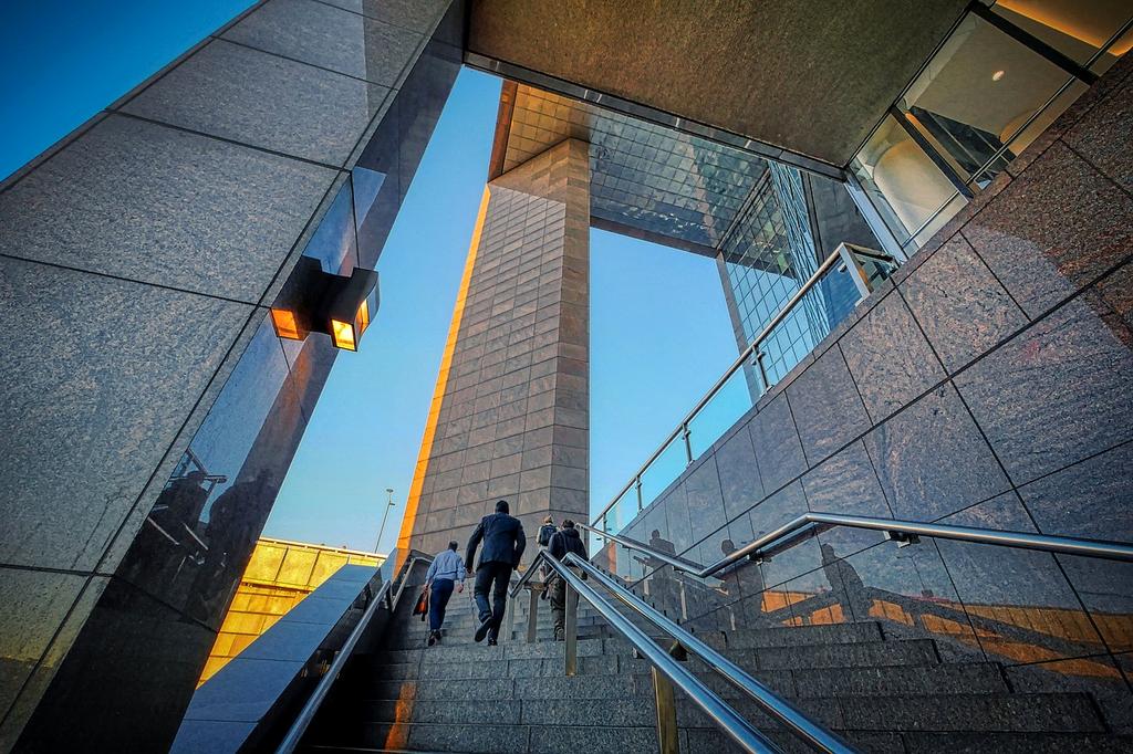 Modern office building architecture representing corporate investment