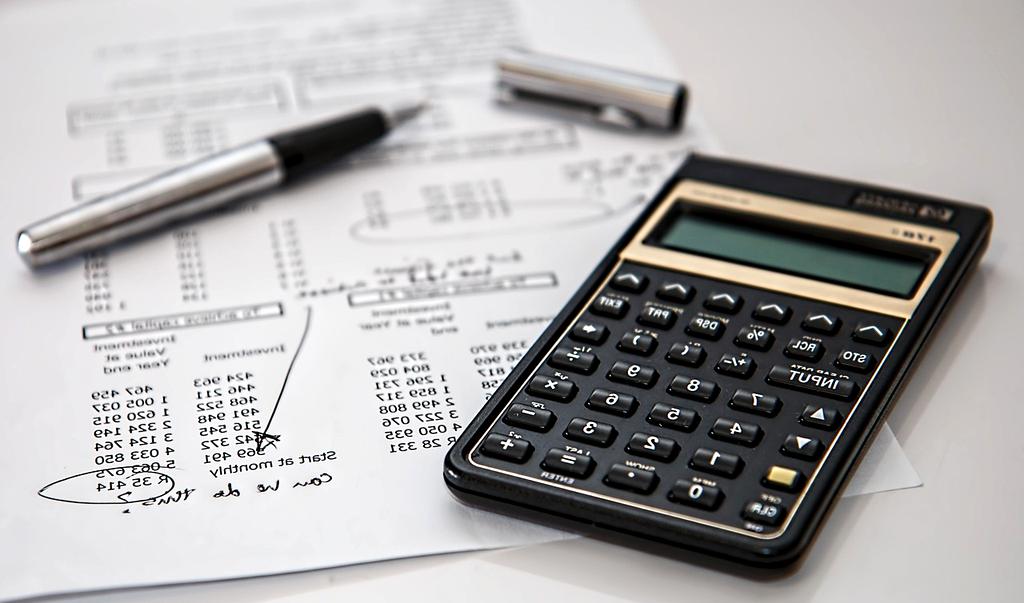 Financial advisor reviewing portfolio charts on a tablet